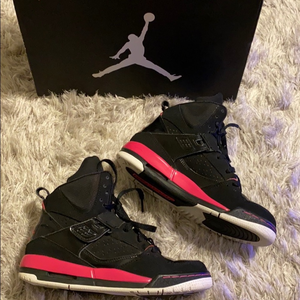 Black, pink, and white Jordan’s. Size 6y 7.5 women